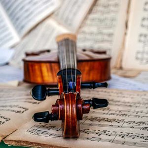 Violin on top of musical scores